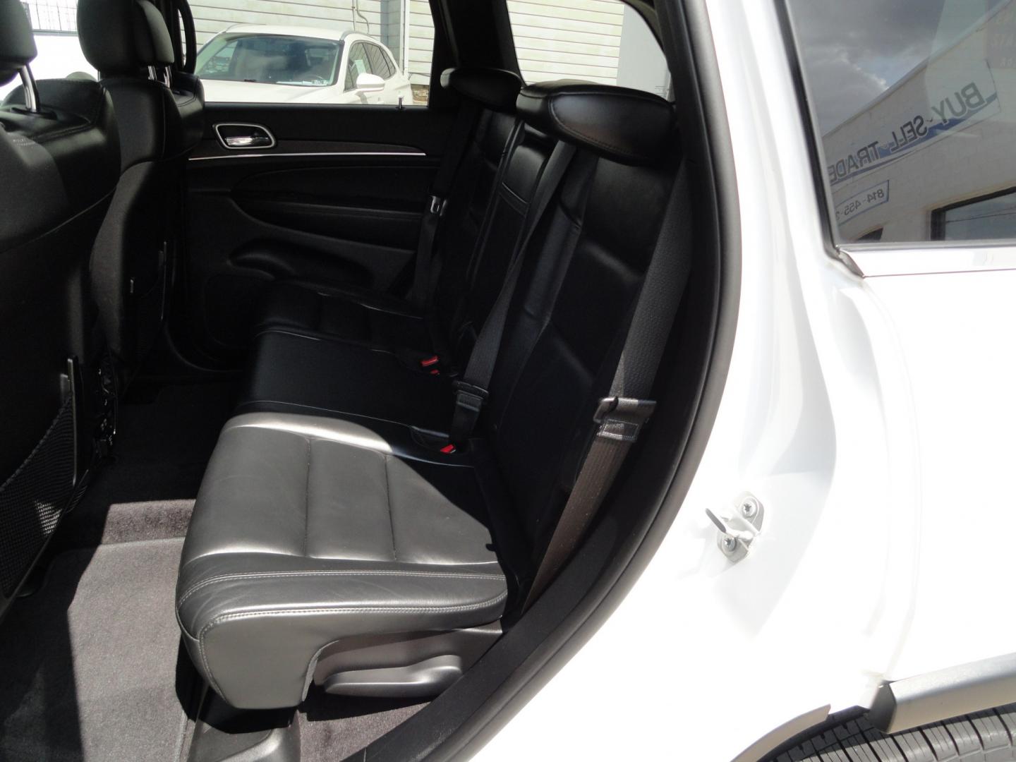 2018 Bright White /Jet Black Jeep Grand Cherokee Limited 4WD (1C4RJFBT2JC) with an 5.7L V8 OHV 16V engine, 8 SPEED AUTOMATIC transmission, located at 827 W 26th Street, Erie, PA, 16508, (814) 455-3401, 42.105431, -80.090942 - Thanks for looking at our two-owner accident and rust-free recent arrival. This is the Limited model with the hard-to-find HEMI 5.7 V-8 engine, four-wheel drive, dual power heated front seats, leather seating areas, back up camera, navigation, power sunroof, power lift gate, remote start, keyless en- Photo#33