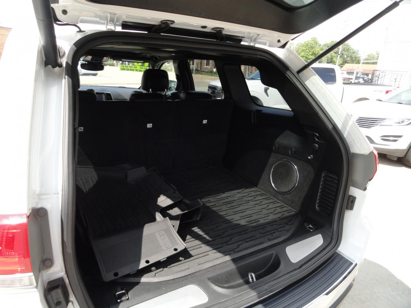 2018 Bright White /Jet Black Jeep Grand Cherokee Limited 4WD (1C4RJFBT2JC) with an 5.7L V8 OHV 16V engine, 8 SPEED AUTOMATIC transmission, located at 827 W 26th Street, Erie, PA, 16508, (814) 455-3401, 42.105431, -80.090942 - Thanks for looking at our two-owner accident and rust-free recent arrival. This is the Limited model with the hard-to-find HEMI 5.7 V-8 engine, four-wheel drive, dual power heated front seats, leather seating areas, back up camera, navigation, power sunroof, power lift gate, remote start, keyless en- Photo#38