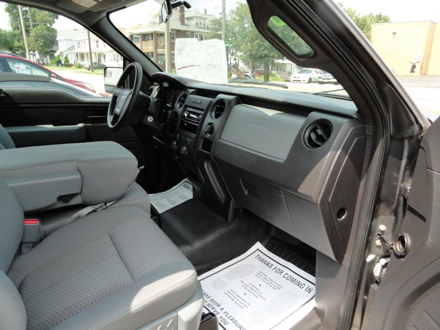 2011 Sterling Gray Metallic /Greystone Ford F-150 XL 6.5-ft. Bed RWD (1FTMF1CMXBF) with an 3.7L V6 DOHC 24V engine, 4 speed Automatic transmission, located at 827 W 26th Street, Erie, PA, 16508, (814) 455-3401, 42.105431, -80.090942 - Thanks for looking at our one owner low mileage accident and rust-free recent trade in. This is the XL model with two-wheel drive, automatic, the gas sipping 3.7L V6 and a recent new Pa state and emissions inspection plus a lube oil and filter change along with four new Goodyear all terrain T/A tire- Photo#24
