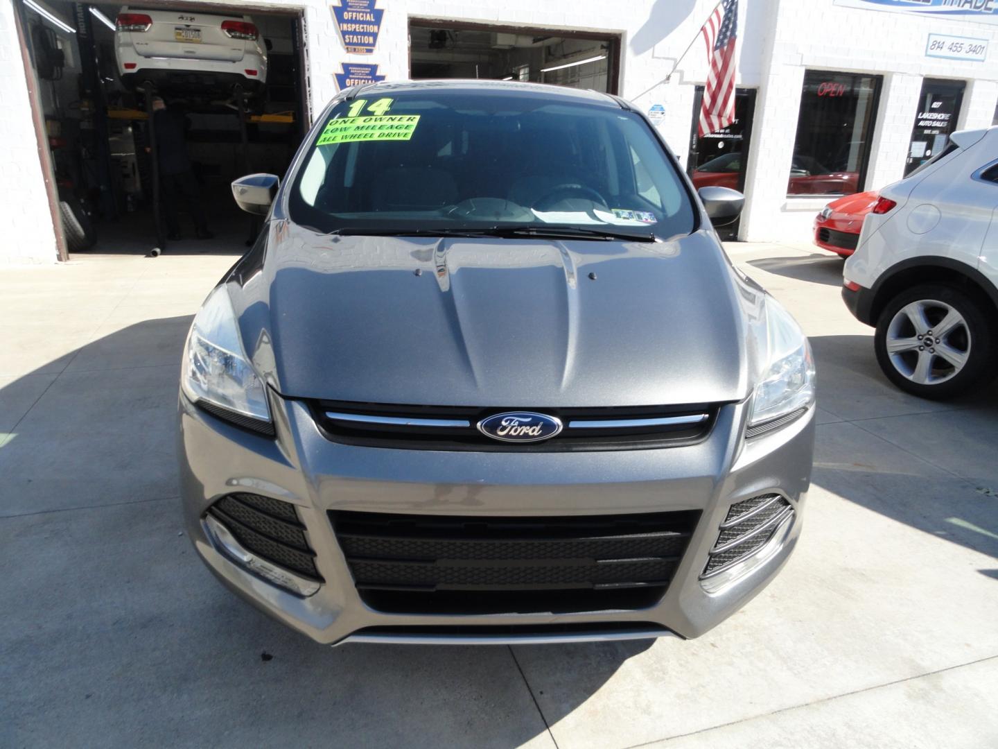 2014 Sterling Gray Metallic /Greystone Ford Escape SE 4WD (1FMCU9GX6EU) with an 1.6L L4 DOHC 16V engine, 6-Speed Automatic transmission, located at 827 W 26th Street, Erie, PA, 16508, (814) 455-3401, 42.105431, -80.090942 - Thanks for looking at our low mileage one owner accident-free recent arrival. This is the SE model with four-wheel drive, power seat, back up camera, Bluetooth, both keys and remotes, the owner's manuals and the factory floor mats. A complete service was just done in our service department and it's- Photo#1