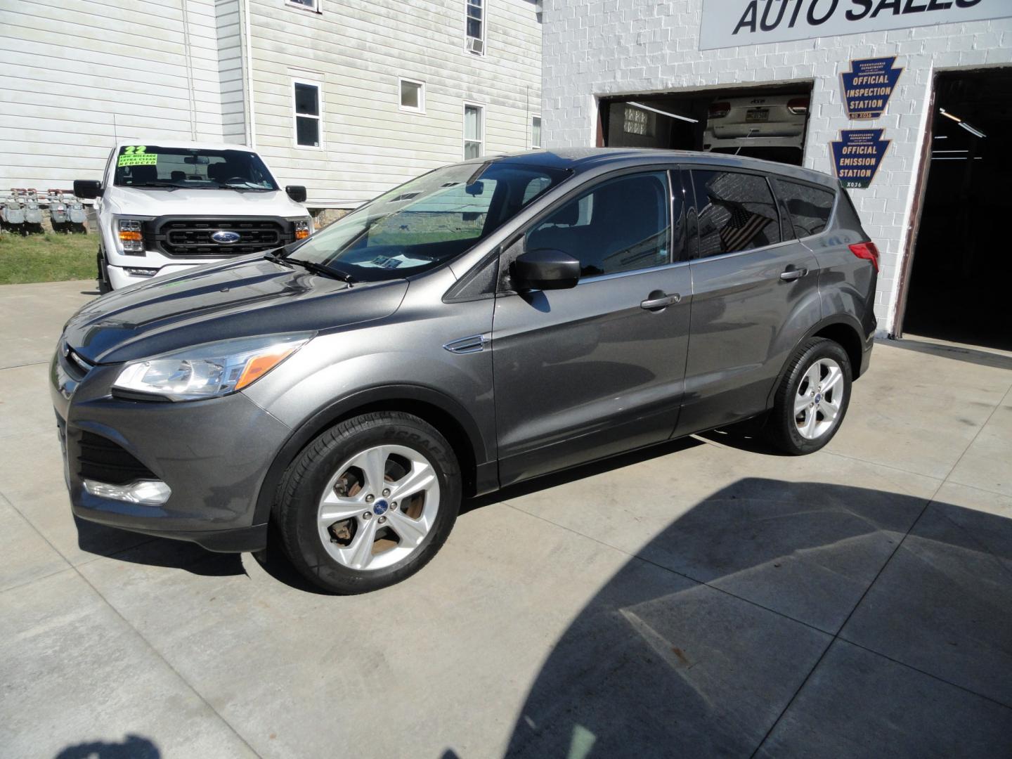 2014 Sterling Gray Metallic /Greystone Ford Escape SE 4WD (1FMCU9GX6EU) with an 1.6L L4 DOHC 16V engine, 6-Speed Automatic transmission, located at 827 W 26th Street, Erie, PA, 16508, (814) 455-3401, 42.105431, -80.090942 - Thanks for looking at our low mileage one owner accident-free recent arrival. This is the SE model with four-wheel drive, power seat, back up camera, Bluetooth, both keys and remotes, the owner's manuals and the factory floor mats. A complete service was just done in our service department and it's- Photo#6
