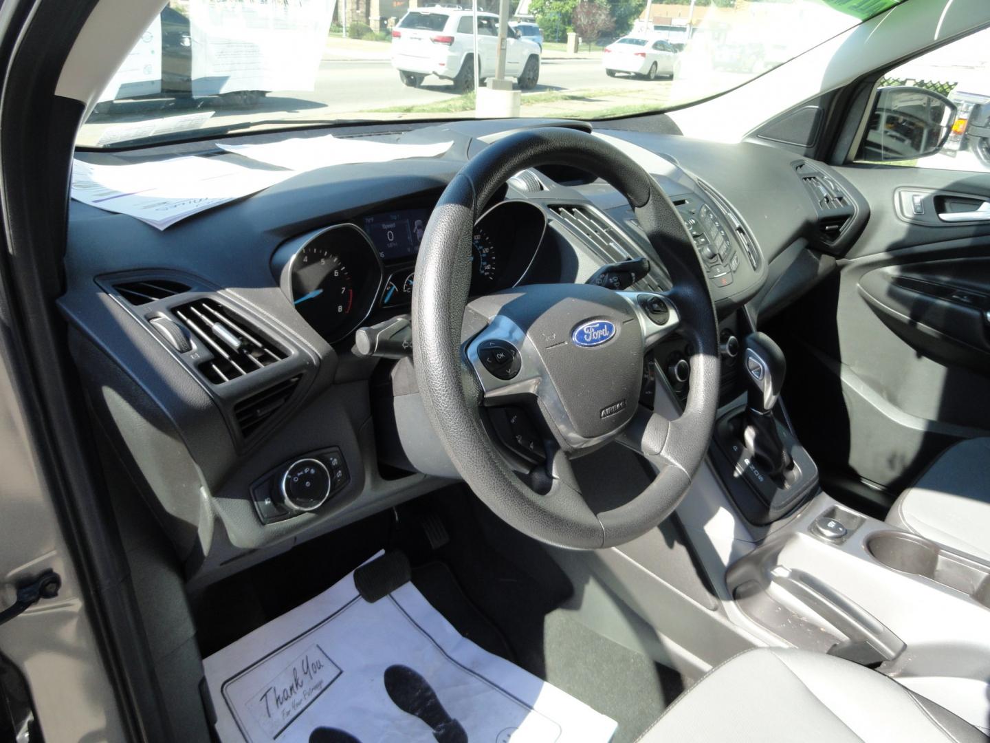 2014 Sterling Gray Metallic /Greystone Ford Escape SE 4WD (1FMCU9GX6EU) with an 1.6L L4 DOHC 16V engine, 6-Speed Automatic transmission, located at 827 W 26th Street, Erie, PA, 16508, (814) 455-3401, 42.105431, -80.090942 - Thanks for looking at our low mileage one owner accident-free recent arrival. This is the SE model with four-wheel drive, power seat, back up camera, Bluetooth, both keys and remotes, the owner's manuals and the factory floor mats. A complete service was just done in our service department and it's- Photo#22