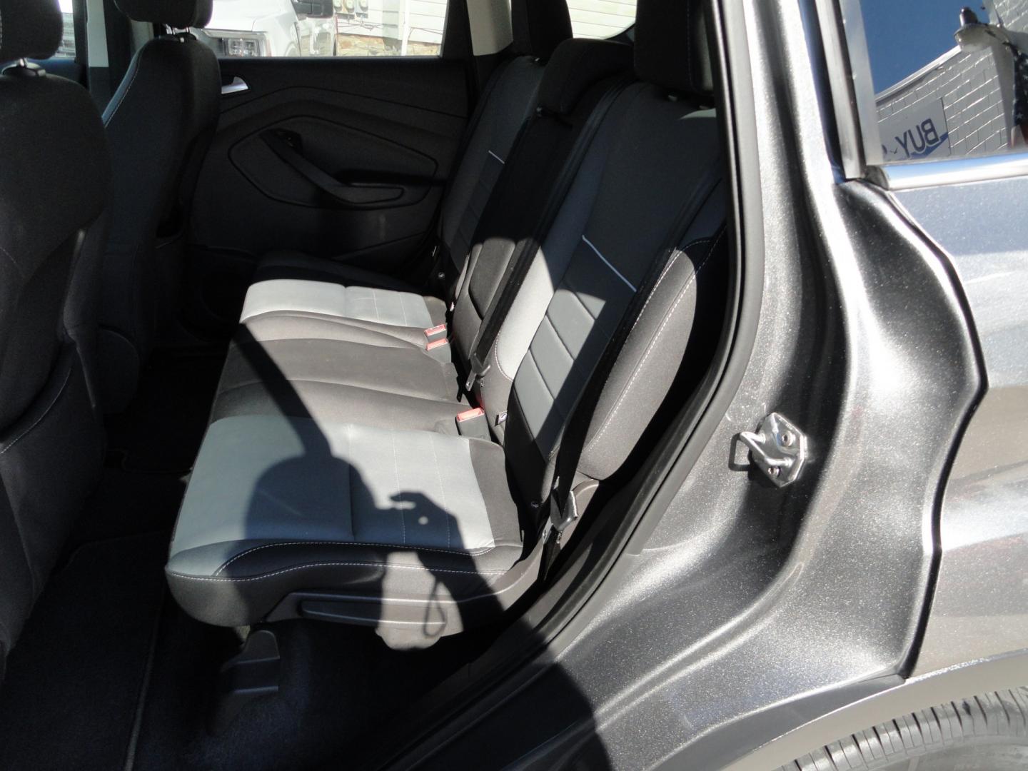 2014 Sterling Gray Metallic /Greystone Ford Escape SE 4WD (1FMCU9GX6EU) with an 1.6L L4 DOHC 16V engine, 6-Speed Automatic transmission, located at 827 W 26th Street, Erie, PA, 16508, (814) 455-3401, 42.105431, -80.090942 - Thanks for looking at our low mileage one owner accident-free recent arrival. This is the SE model with four-wheel drive, power seat, back up camera, Bluetooth, both keys and remotes, the owner's manuals and the factory floor mats. A complete service was just done in our service department and it's- Photo#25