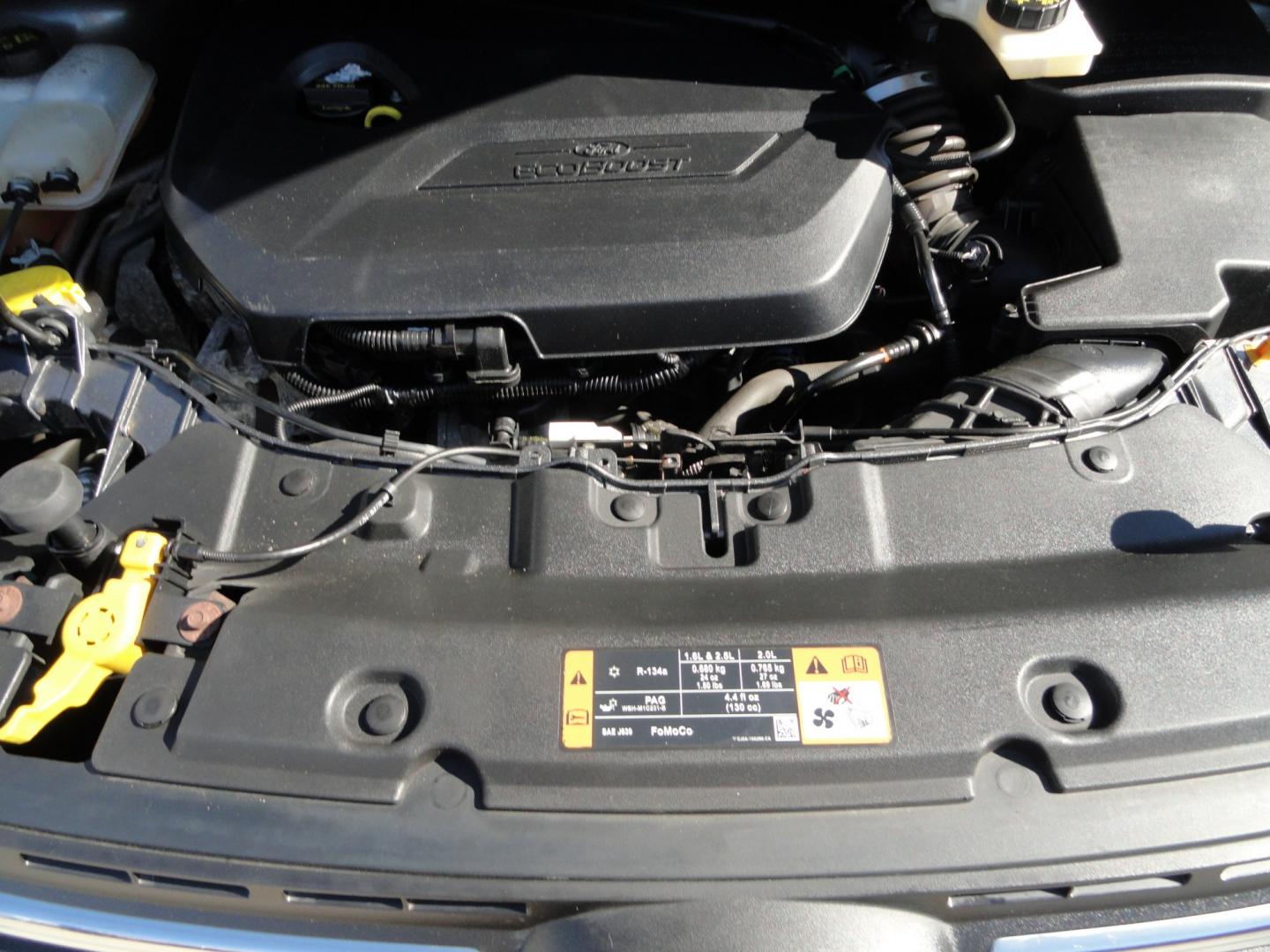 2014 Sterling Gray Metallic /Greystone Ford Escape SE 4WD (1FMCU9GX6EU) with an 1.6L L4 DOHC 16V engine, 6-Speed Automatic transmission, located at 827 W 26th Street, Erie, PA, 16508, (814) 455-3401, 42.105431, -80.090942 - Thanks for looking at our low mileage one owner accident-free recent arrival. This is the SE model with four-wheel drive, power seat, back up camera, Bluetooth, both keys and remotes, the owner's manuals and the factory floor mats. A complete service was just done in our service department and it's- Photo#37