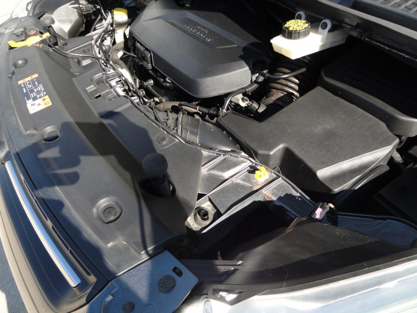 2014 Sterling Gray Metallic /Greystone Ford Escape SE 4WD (1FMCU9GX6EU) with an 1.6L L4 DOHC 16V engine, 6-Speed Automatic transmission, located at 827 W 26th Street, Erie, PA, 16508, (814) 455-3401, 42.105431, -80.090942 - Thanks for looking at our low mileage one owner accident-free recent arrival. This is the SE model with four-wheel drive, power seat, back up camera, Bluetooth, both keys and remotes, the owner's manuals and the factory floor mats. A complete service was just done in our service department and it's- Photo#38