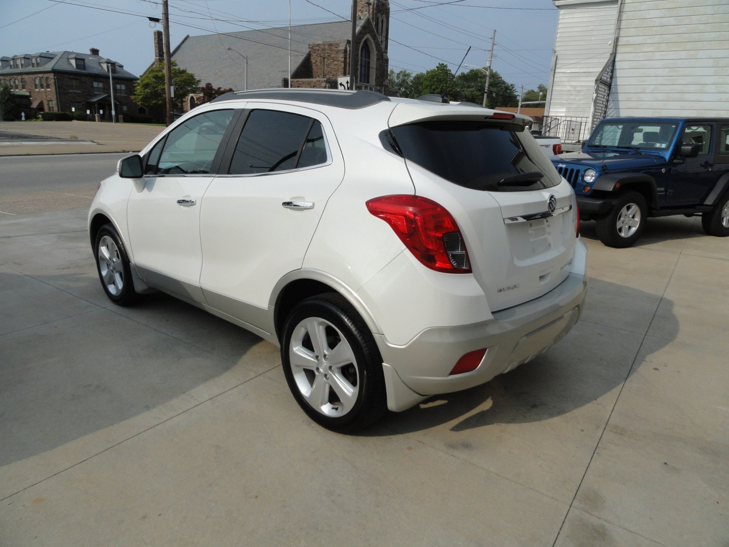 2016 While Pearl Tricoat /Titanium Buick Encore Convenience AWD (KL4CJFSB8GB) with an 1.4L L4 DOHC 16V TURBO engine, 6-Speed Automatic transmission, located at 827 W 26th Street, Erie, PA, 16508, (814) 455-3401, 42.105431, -80.090942- Photo#5