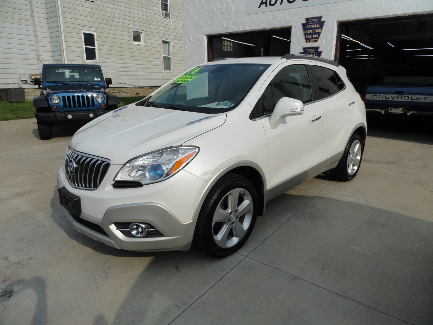2016 While Pearl Tricoat /Titanium Buick Encore Convenience AWD (KL4CJFSB8GB) with an 1.4L L4 DOHC 16V TURBO engine, 6-Speed Automatic transmission, located at 827 W 26th Street, Erie, PA, 16508, (814) 455-3401, 42.105431, -80.090942- Photo#6