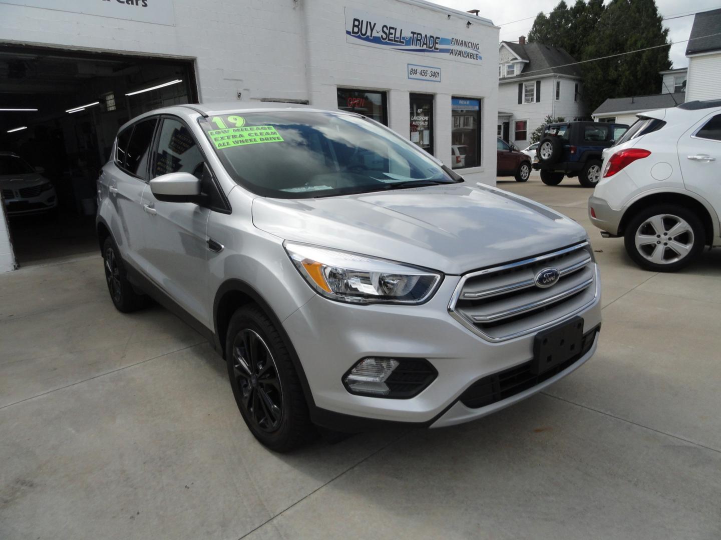 2019 Ingot Silver Metallic /Greystone Ford Escape SE 4WD (1FMCU9GDXKU) with an 1.5L L4 DOHC 16V engine, 6-Speed Automatic transmission, located at 827 W 26th Street, Erie, PA, 16508, (814) 455-3401, 42.105431, -80.090942 - Thanks for looking at our low mileage two owner accident-free recent arrival. This is the SE model with four-wheel drive, remote start, keyless entry, push button start, back up camera and lots more. A full service was just completed in our service department with new Pa state and emissions inspecti- Photo#0
