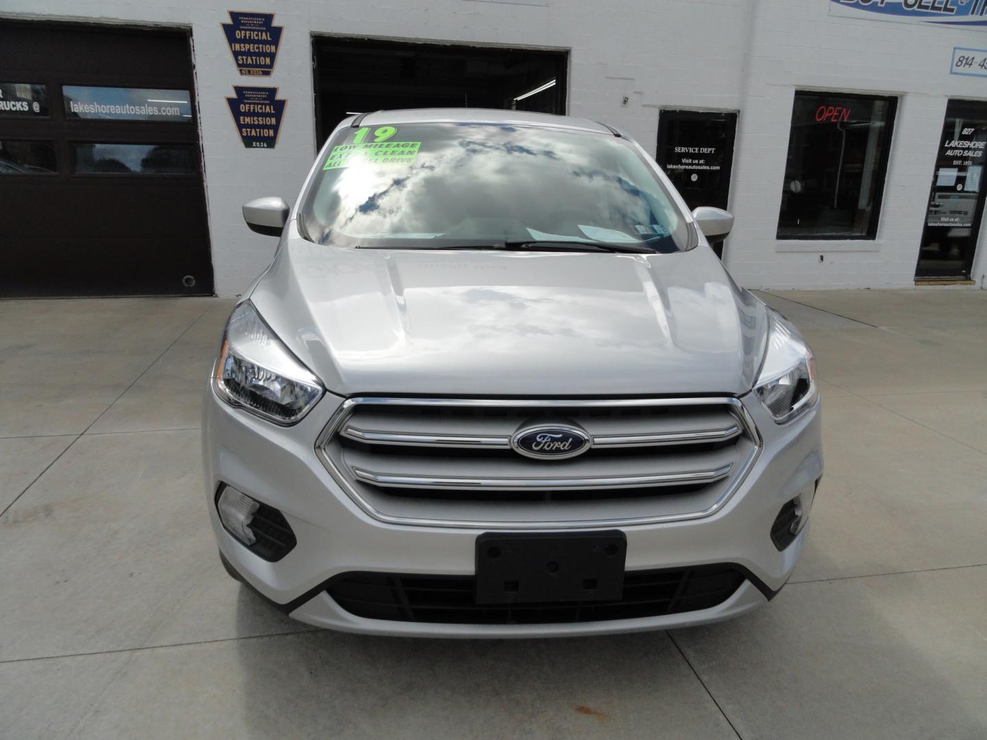2019 Ingot Silver Metallic /Greystone Ford Escape SE 4WD (1FMCU9GDXKU) with an 1.5L L4 DOHC 16V engine, 6-Speed Automatic transmission, located at 827 W 26th Street, Erie, PA, 16508, (814) 455-3401, 42.105431, -80.090942 - Thanks for looking at our low mileage two owner accident-free recent arrival. This is the SE model with four-wheel drive, remote start, keyless entry, push button start, back up camera and lots more. A full service was just completed in our service department with new Pa state and emissions inspecti- Photo#1