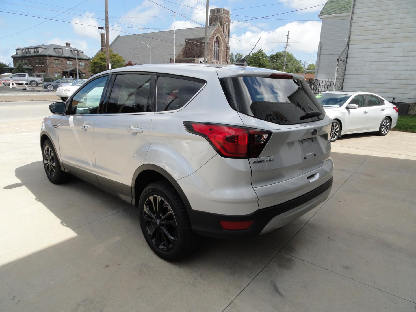 2019 Ingot Silver Metallic /Greystone Ford Escape SE 4WD (1FMCU9GDXKU) with an 1.5L L4 DOHC 16V engine, 6-Speed Automatic transmission, located at 827 W 26th Street, Erie, PA, 16508, (814) 455-3401, 42.105431, -80.090942 - Thanks for looking at our low mileage two owner accident-free recent arrival. This is the SE model with four-wheel drive, remote start, keyless entry, push button start, back up camera and lots more. A full service was just completed in our service department with new Pa state and emissions inspecti- Photo#5
