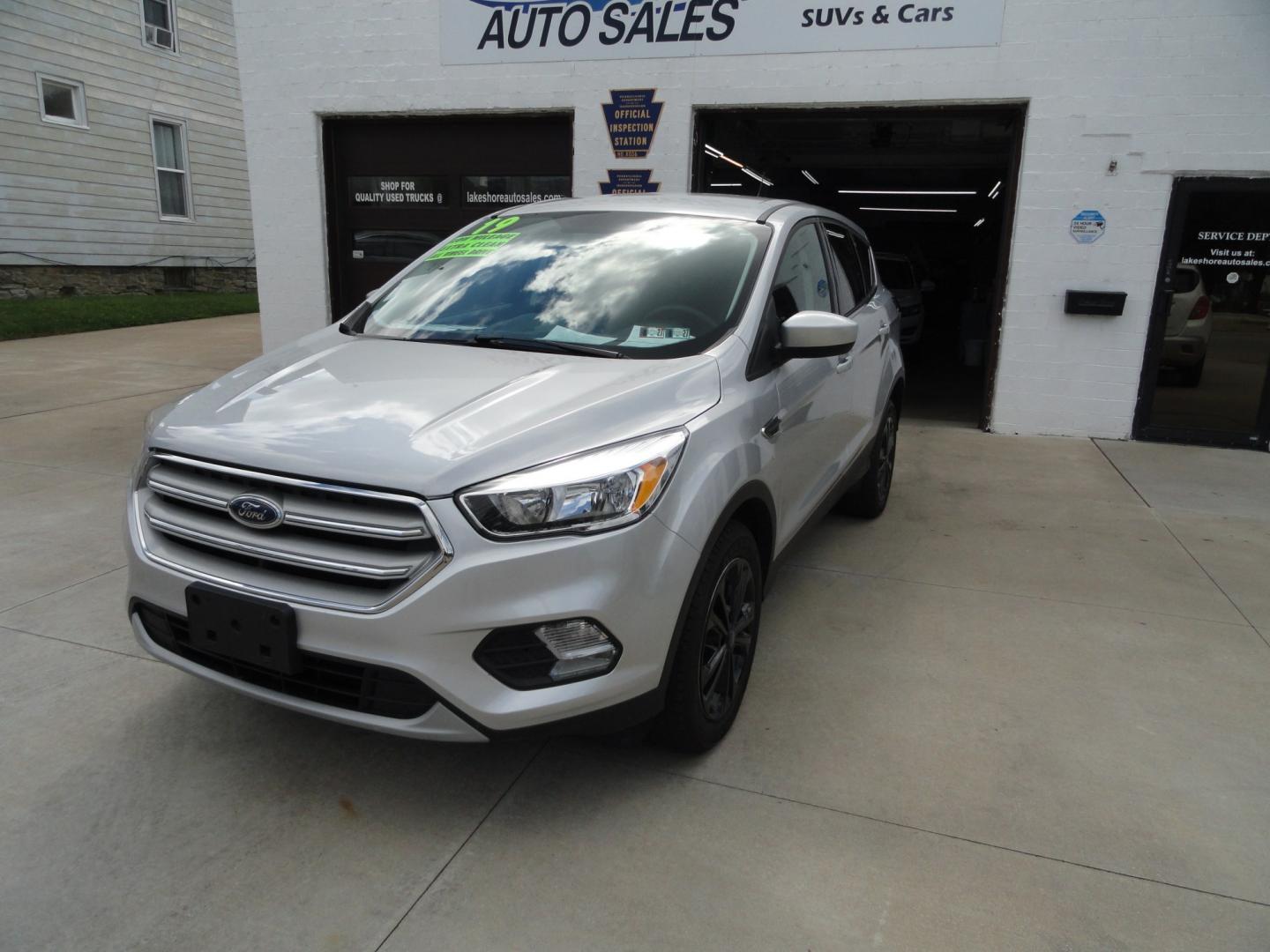 2019 Ingot Silver Metallic /Greystone Ford Escape SE 4WD (1FMCU9GDXKU) with an 1.5L L4 DOHC 16V engine, 6-Speed Automatic transmission, located at 827 W 26th Street, Erie, PA, 16508, (814) 455-3401, 42.105431, -80.090942 - Thanks for looking at our low mileage two owner accident-free recent arrival. This is the SE model with four-wheel drive, remote start, keyless entry, push button start, back up camera and lots more. A full service was just completed in our service department with new Pa state and emissions inspecti- Photo#7