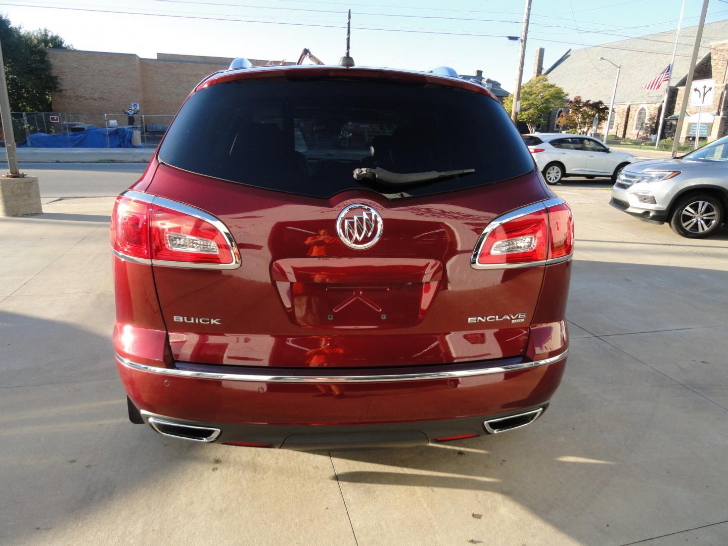 2017 Crismon Red metallic /Jet Black Buick Enclave Leather AWD (5GAKVBKD9HJ) with an 3.6L V6 DOHC 24V engine, 6-Speed Automatic transmission, located at 827 W 26th Street, Erie, PA, 16508, (814) 455-3401, 42.105431, -80.090942 - Thanks for looking at our super clan rust free new arrival. This is the Enclave model with all wheel drive, power heated seats, power sunroof, remote start, passive entry, remote start,blind spot monitor Bluetooth, back up camera and lots more. A full service was just completed in in our service dep- Photo#4