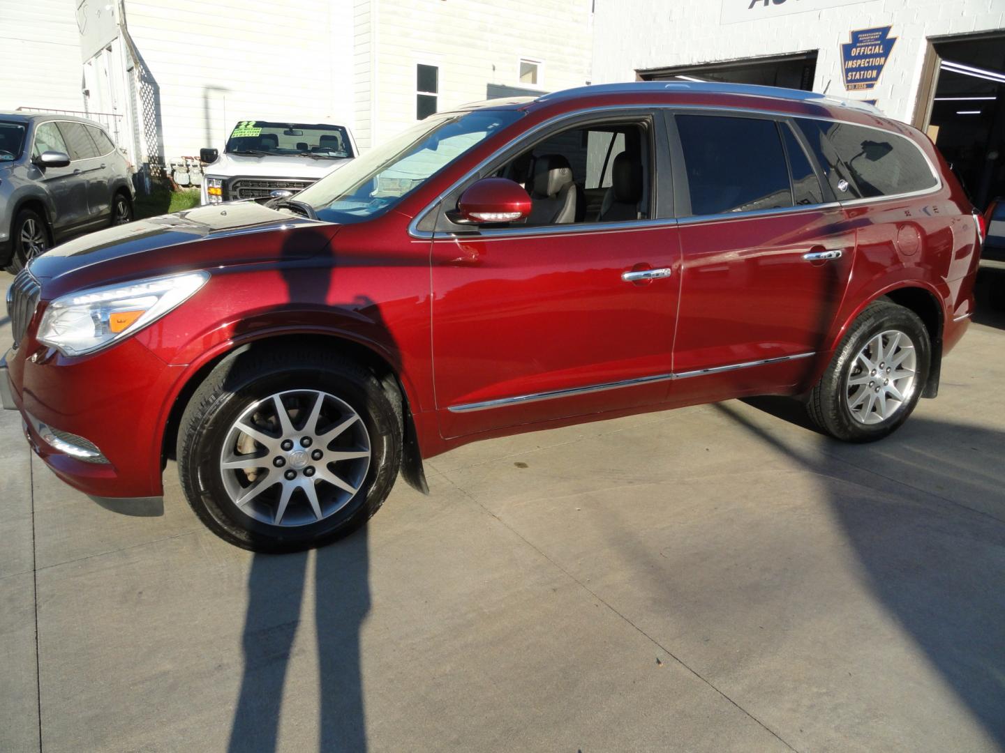 2017 Crismon Red metallic /Jet Black Buick Enclave Leather AWD (5GAKVBKD9HJ) with an 3.6L V6 DOHC 24V engine, 6-Speed Automatic transmission, located at 827 W 26th Street, Erie, PA, 16508, (814) 455-3401, 42.105431, -80.090942 - Thanks for looking at our super clan rust free new arrival. This is the Enclave model with all wheel drive, power heated seats, power sunroof, remote start, passive entry, remote start,blind spot monitor Bluetooth, back up camera and lots more. A full service was just completed in in our service dep- Photo#6
