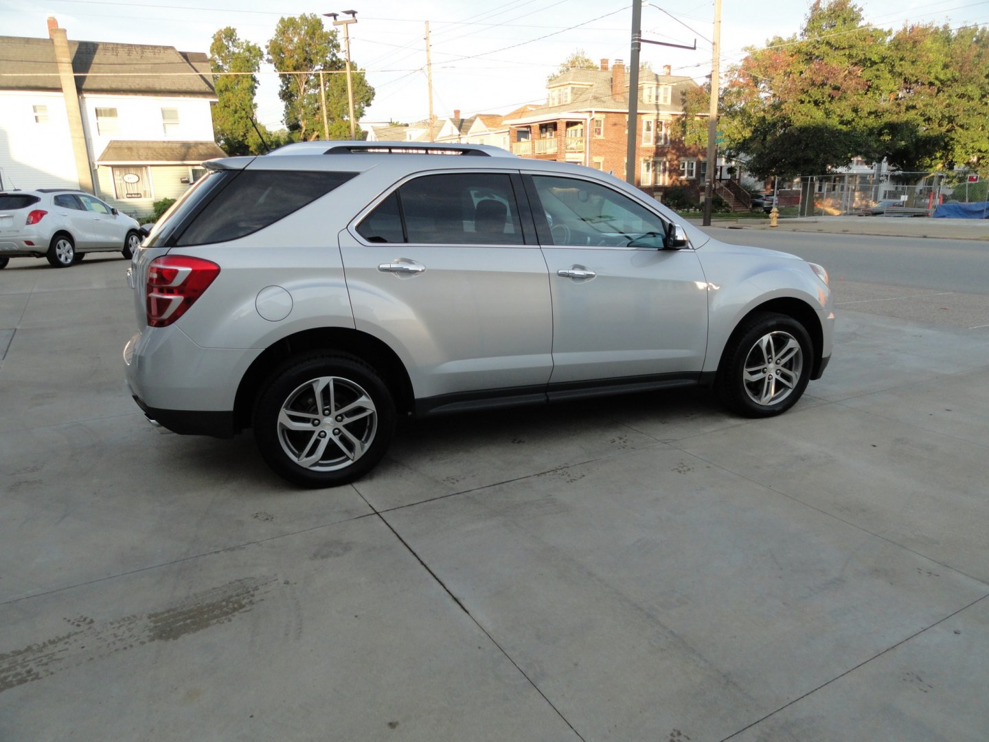 2016 Silver Ice Metallic /Two Tone Chevrolet Equinox LTZ AWD (2GNFLGE38G6) with an 3.6L V6 DOHC 24V engine, 6-Speed Automatic transmission, located at 827 W 26th Street, Erie, PA, 16508, (814) 455-3401, 42.105431, -80.090942 - Thanks for looking at our accident and rust-free like new recent arrival. I have to say that this is the cleanest 2016 Chevy Equinox that I've seen on a long time with NO RUST with no exterior paint work and a super clean undercarriage. This is the LTZ model with the hard to find 6 cylinders, all-wh- Photo#2