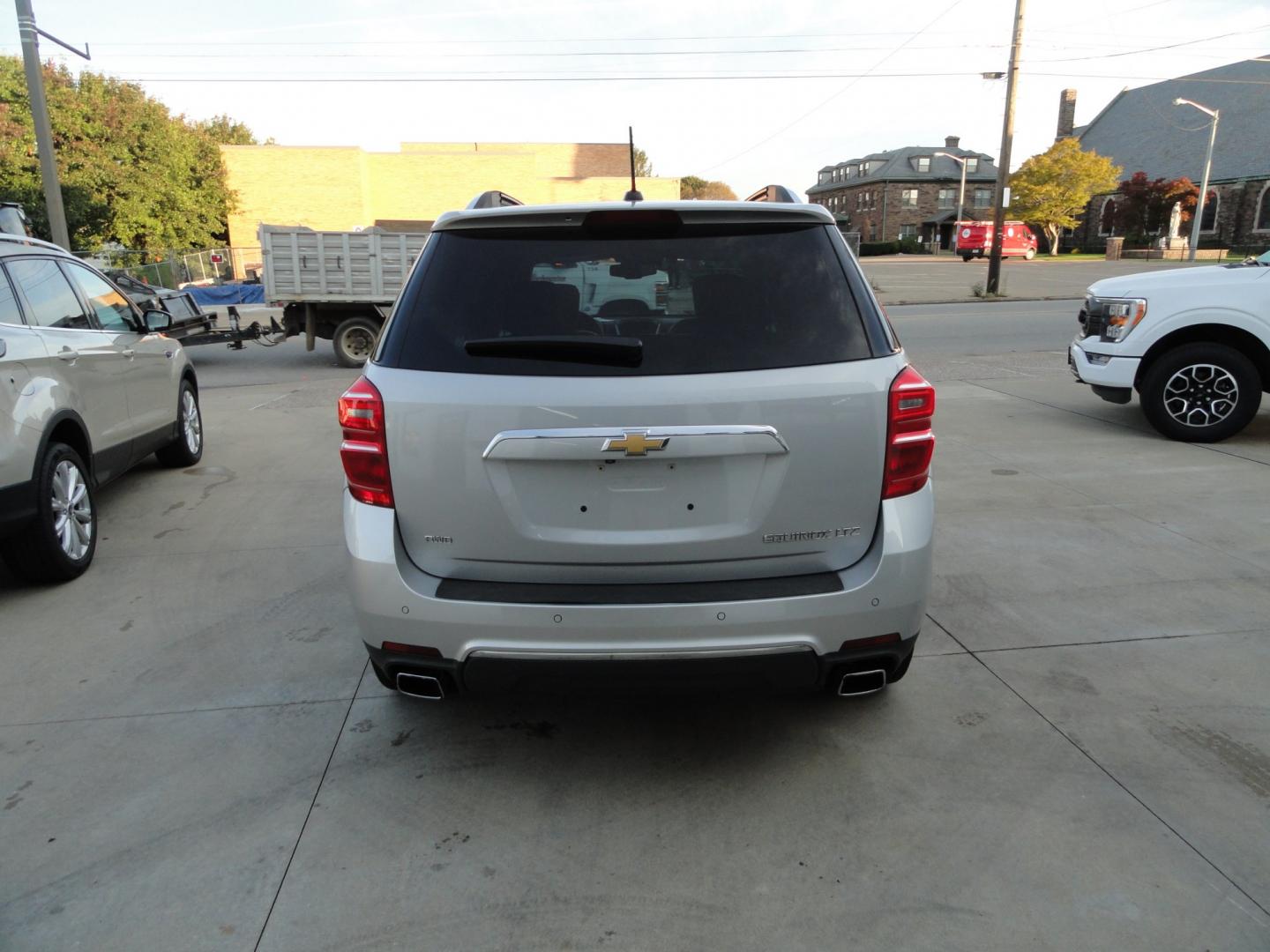 2016 Silver Ice Metallic /Two Tone Chevrolet Equinox LTZ AWD (2GNFLGE38G6) with an 3.6L V6 DOHC 24V engine, 6-Speed Automatic transmission, located at 827 W 26th Street, Erie, PA, 16508, (814) 455-3401, 42.105431, -80.090942 - Thanks for looking at our accident and rust-free like new recent arrival. I have to say that this is the cleanest 2016 Chevy Equinox that I've seen on a long time with NO RUST with no exterior paint work and a super clean undercarriage. This is the LTZ model with the hard to find 6 cylinders, all-wh- Photo#3