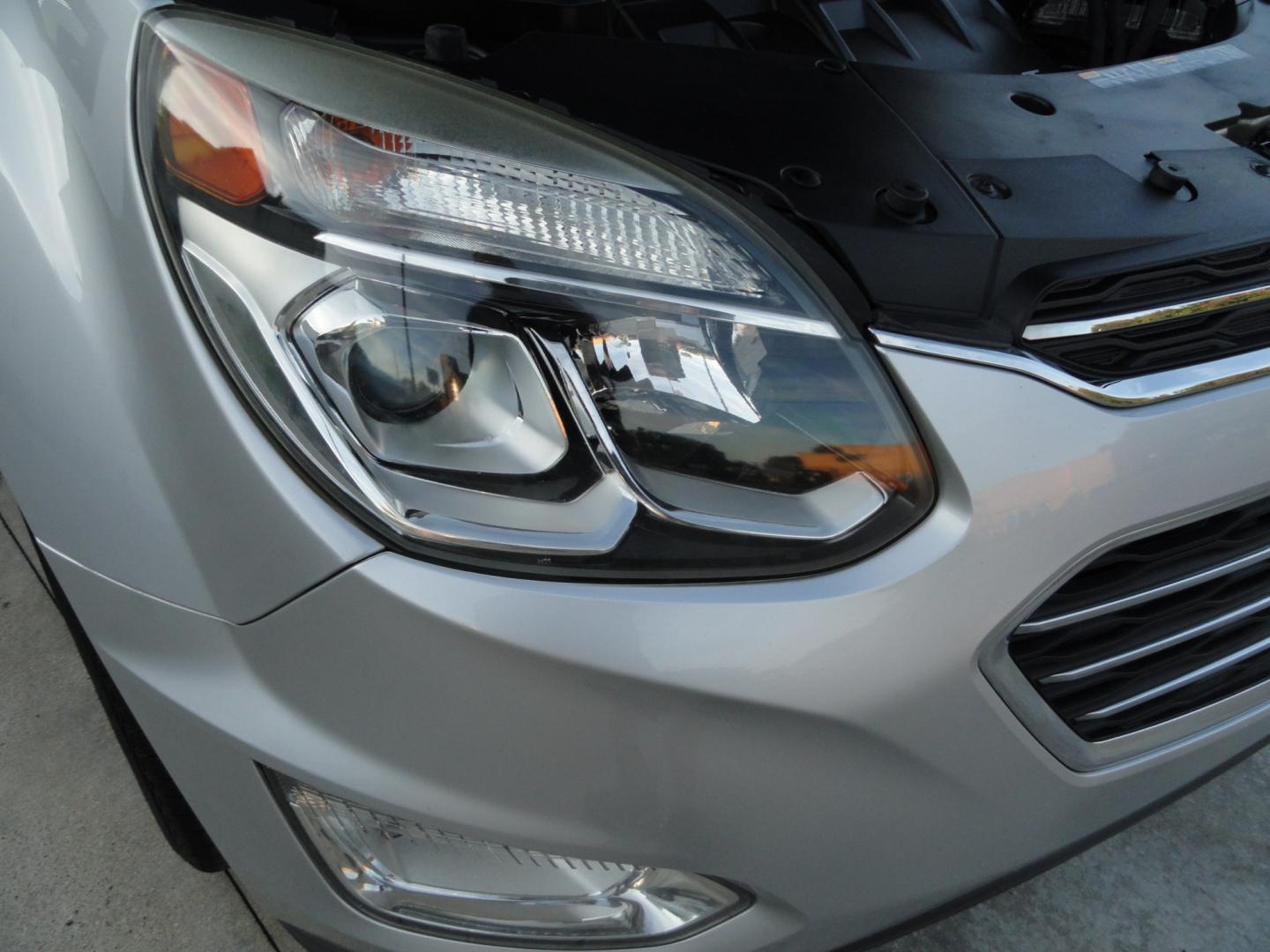 2016 Silver Ice Metallic /Two Tone Chevrolet Equinox LTZ AWD (2GNFLGE38G6) with an 3.6L V6 DOHC 24V engine, 6-Speed Automatic transmission, located at 827 W 26th Street, Erie, PA, 16508, (814) 455-3401, 42.105431, -80.090942 - Thanks for looking at our accident and rust-free like new recent arrival. I have to say that this is the cleanest 2016 Chevy Equinox that I've seen on a long time with NO RUST with no exterior paint work and a super clean undercarriage. This is the LTZ model with the hard to find 6 cylinders, all-wh- Photo#53