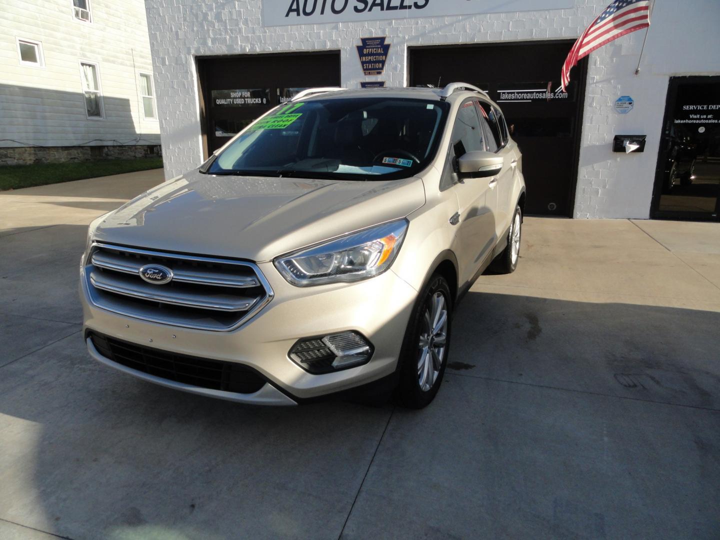 2017 White Gold Metallic /Black Ford Escape Titanium 4WD (1FMCU9J97HU) with an 2.0L L4 DOHC 16V engine, 6-Speed Automatic transmission, located at 827 W 26th Street, Erie, PA, 16508, (814) 455-3401, 42.105431, -80.090942 - Thanks for looking at our extra clean accident and rust free two owner recent arrival. This is the top-of-the-line Titanium four-wheel drive model that's in like new condition with no paint or body damage and the nonsmoker interior is like new also, plus it comes with all the options available inclu- Photo#7