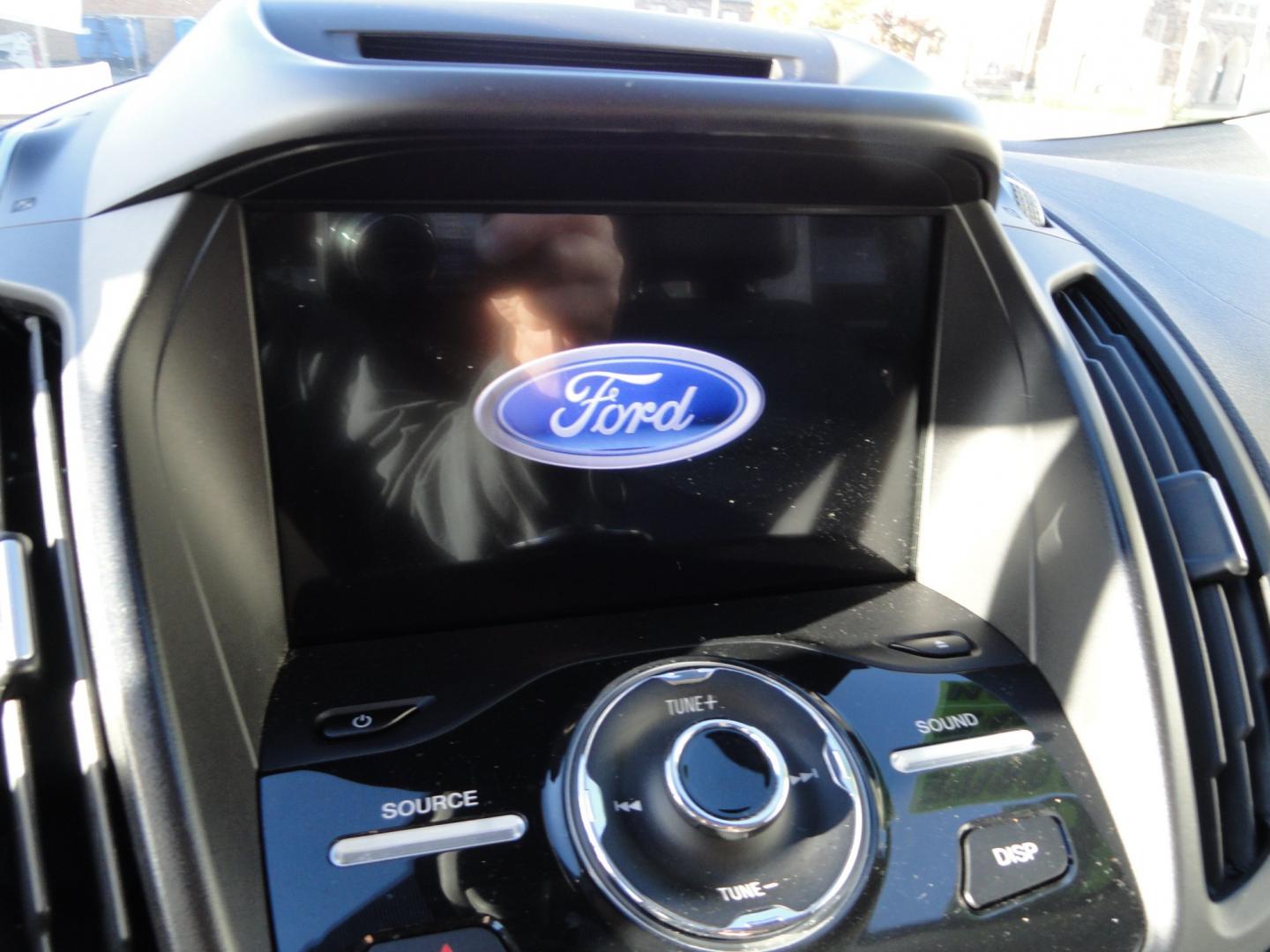 2017 White Gold Metallic /Black Ford Escape Titanium 4WD (1FMCU9J97HU) with an 2.0L L4 DOHC 16V engine, 6-Speed Automatic transmission, located at 827 W 26th Street, Erie, PA, 16508, (814) 455-3401, 42.105431, -80.090942 - Thanks for looking at our extra clean accident and rust free two owner recent arrival. This is the top-of-the-line Titanium four-wheel drive model that's in like new condition with no paint or body damage and the nonsmoker interior is like new also, plus it comes with all the options available inclu- Photo#9