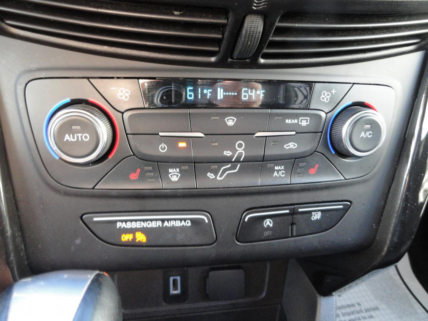 2017 White Gold Metallic /Black Ford Escape Titanium 4WD (1FMCU9J97HU) with an 2.0L L4 DOHC 16V engine, 6-Speed Automatic transmission, located at 827 W 26th Street, Erie, PA, 16508, (814) 455-3401, 42.105431, -80.090942 - Thanks for looking at our extra clean accident and rust free two owner recent arrival. This is the top-of-the-line Titanium four-wheel drive model that's in like new condition with no paint or body damage and the nonsmoker interior is like new also, plus it comes with all the options available inclu- Photo#12