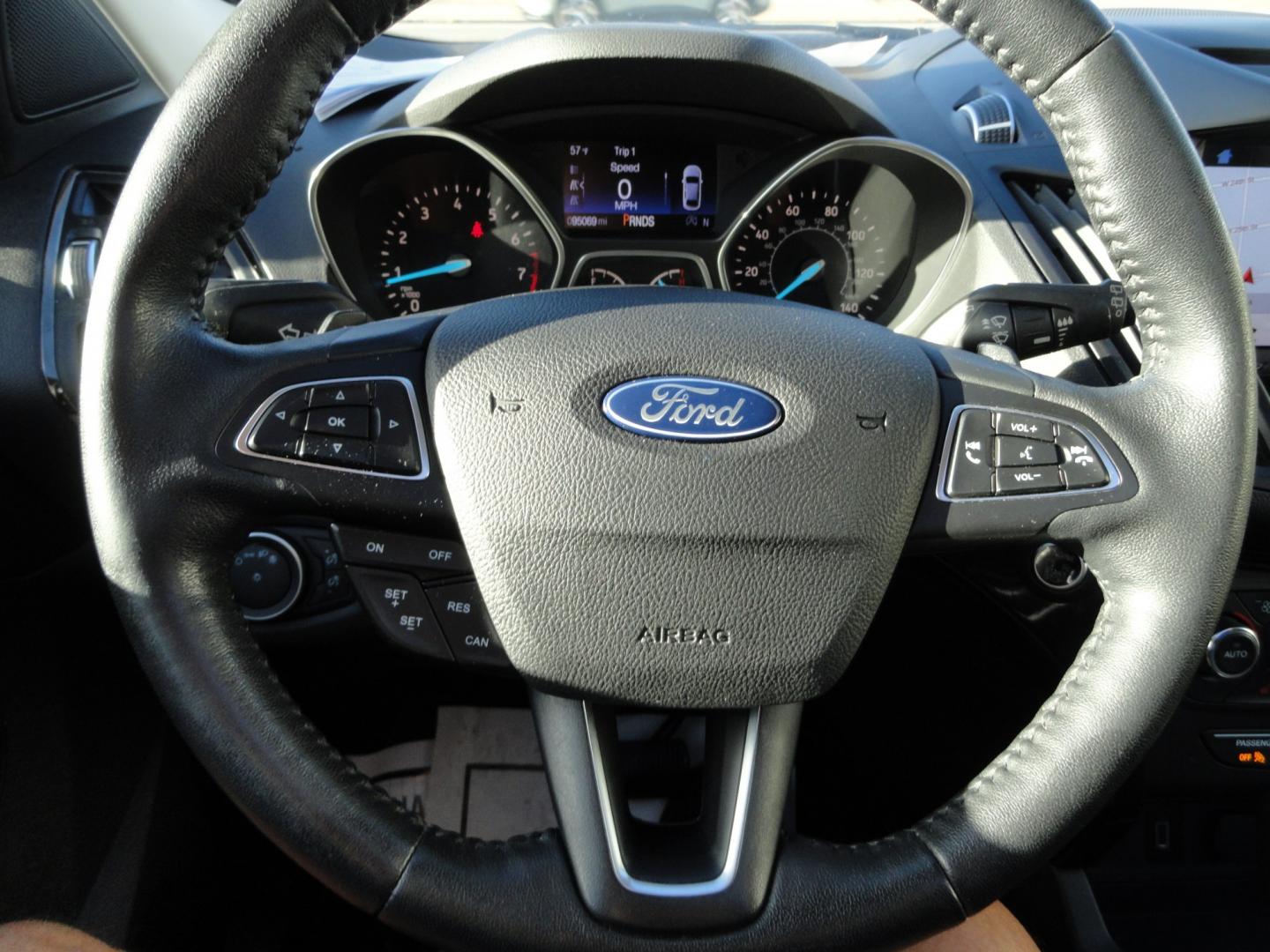 2017 White Gold Metallic /Black Ford Escape Titanium 4WD (1FMCU9J97HU) with an 2.0L L4 DOHC 16V engine, 6-Speed Automatic transmission, located at 827 W 26th Street, Erie, PA, 16508, (814) 455-3401, 42.105431, -80.090942 - Thanks for looking at our extra clean accident and rust free two owner recent arrival. This is the top-of-the-line Titanium four-wheel drive model that's in like new condition with no paint or body damage and the nonsmoker interior is like new also, plus it comes with all the options available inclu- Photo#14