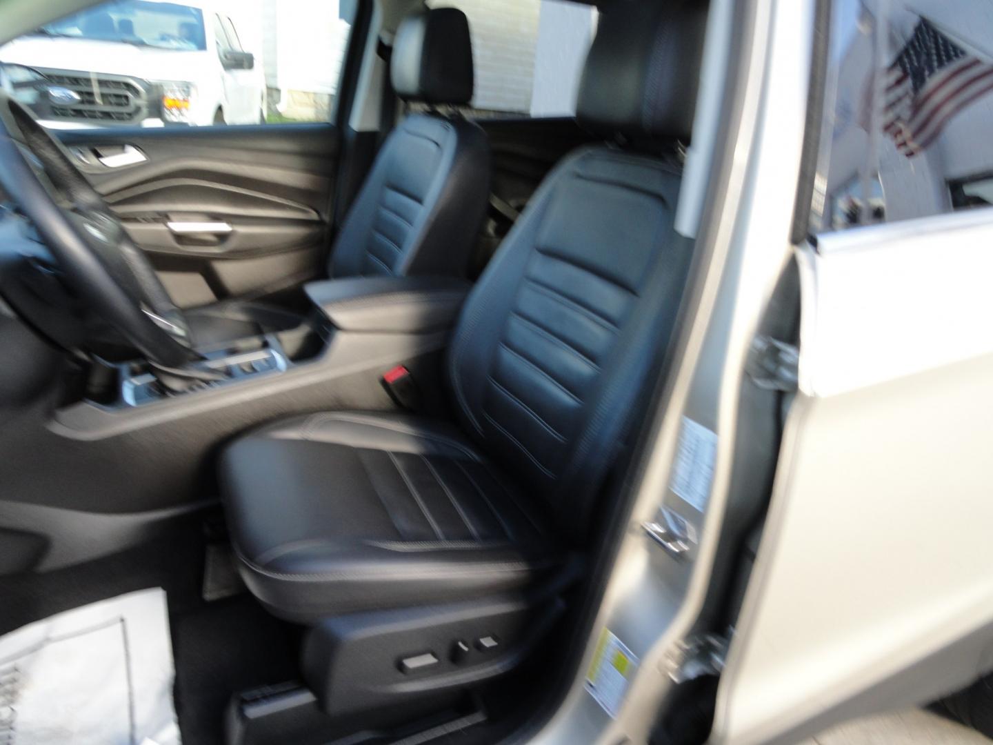 2017 White Gold Metallic /Black Ford Escape Titanium 4WD (1FMCU9J97HU) with an 2.0L L4 DOHC 16V engine, 6-Speed Automatic transmission, located at 827 W 26th Street, Erie, PA, 16508, (814) 455-3401, 42.105431, -80.090942 - Thanks for looking at our extra clean accident and rust free two owner recent arrival. This is the top-of-the-line Titanium four-wheel drive model that's in like new condition with no paint or body damage and the nonsmoker interior is like new also, plus it comes with all the options available inclu- Photo#22