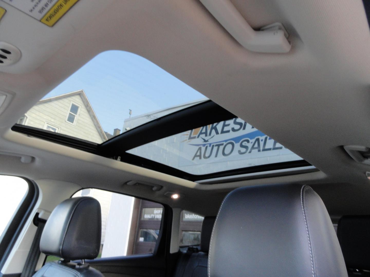 2017 White Gold Metallic /Black Ford Escape Titanium 4WD (1FMCU9J97HU) with an 2.0L L4 DOHC 16V engine, 6-Speed Automatic transmission, located at 827 W 26th Street, Erie, PA, 16508, (814) 455-3401, 42.105431, -80.090942 - Thanks for looking at our extra clean accident and rust free two owner recent arrival. This is the top-of-the-line Titanium four-wheel drive model that's in like new condition with no paint or body damage and the nonsmoker interior is like new also, plus it comes with all the options available inclu- Photo#24
