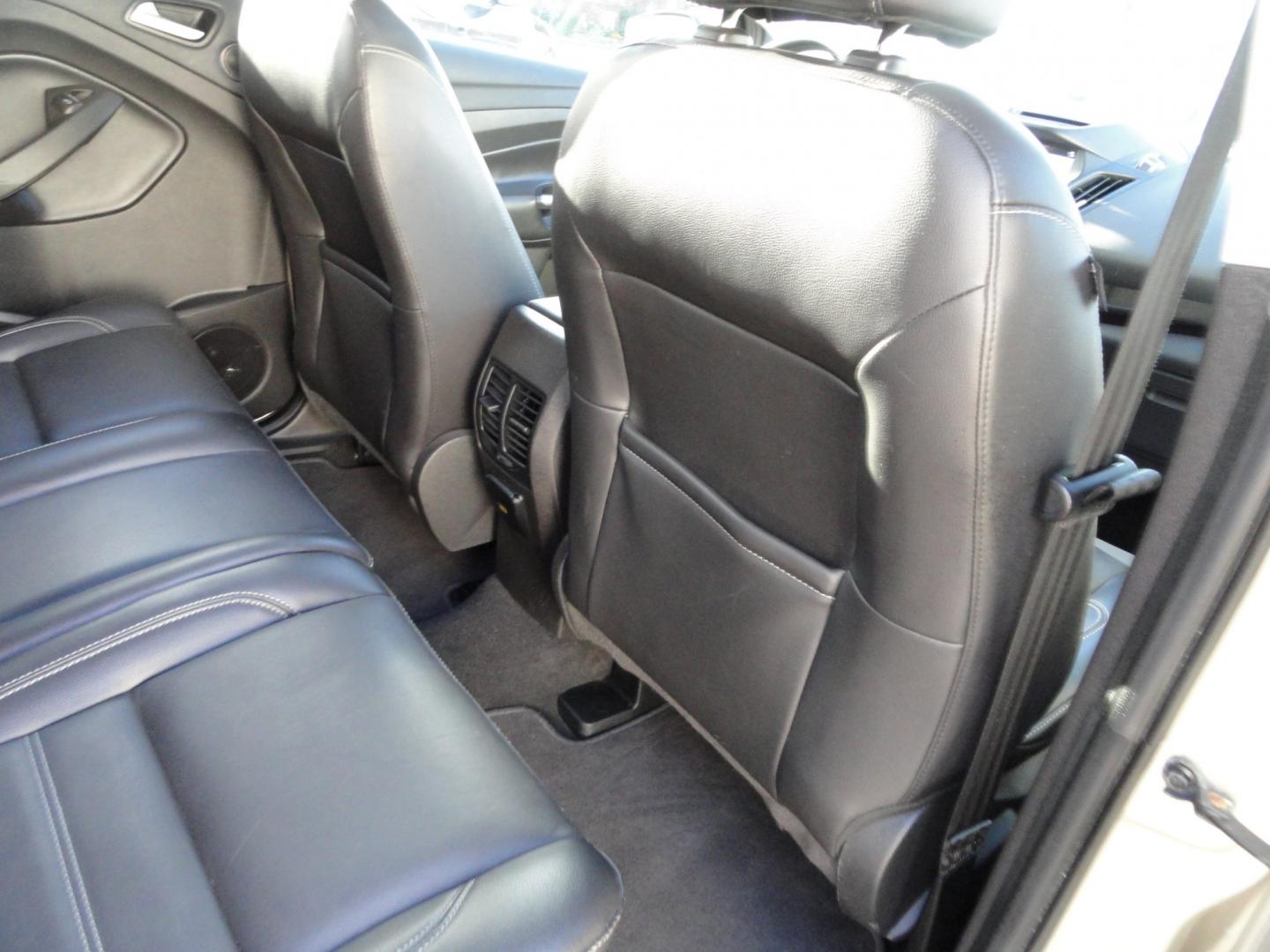 2017 White Gold Metallic /Black Ford Escape Titanium 4WD (1FMCU9J97HU) with an 2.0L L4 DOHC 16V engine, 6-Speed Automatic transmission, located at 827 W 26th Street, Erie, PA, 16508, (814) 455-3401, 42.105431, -80.090942 - Thanks for looking at our extra clean accident and rust free two owner recent arrival. This is the top-of-the-line Titanium four-wheel drive model that's in like new condition with no paint or body damage and the nonsmoker interior is like new also, plus it comes with all the options available inclu- Photo#39
