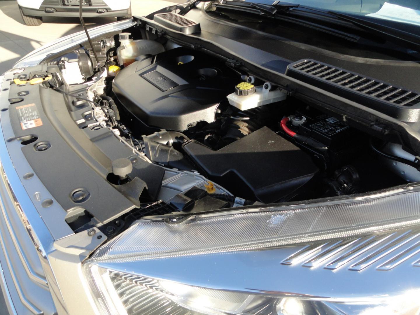 2017 White Gold Metallic /Black Ford Escape Titanium 4WD (1FMCU9J97HU) with an 2.0L L4 DOHC 16V engine, 6-Speed Automatic transmission, located at 827 W 26th Street, Erie, PA, 16508, (814) 455-3401, 42.105431, -80.090942 - Thanks for looking at our extra clean accident and rust free two owner recent arrival. This is the top-of-the-line Titanium four-wheel drive model that's in like new condition with no paint or body damage and the nonsmoker interior is like new also, plus it comes with all the options available inclu- Photo#54