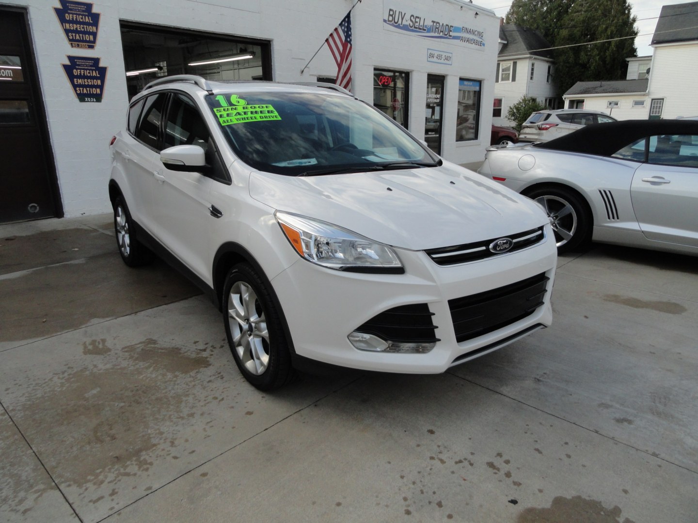 2016 White Platinum Metallic /Tan Ford Escape Titanium 4WD (1FMCU9J92GU) with an 2.0L L4 DOHC 16V engine, 6-Speed Automatic transmission, located at 827 W 26th Street, Erie, PA, 16508, (814) 455-3401, 42.105431, -80.090942 - Thanks for looking at our super clean two owner accident-free recent arrival. This is the Titanium model with four-wheel drive and pretty much has all the options that were available in the 2016 model year. A full service was just completed in our service department with new Pa state and emissions i- Photo#0