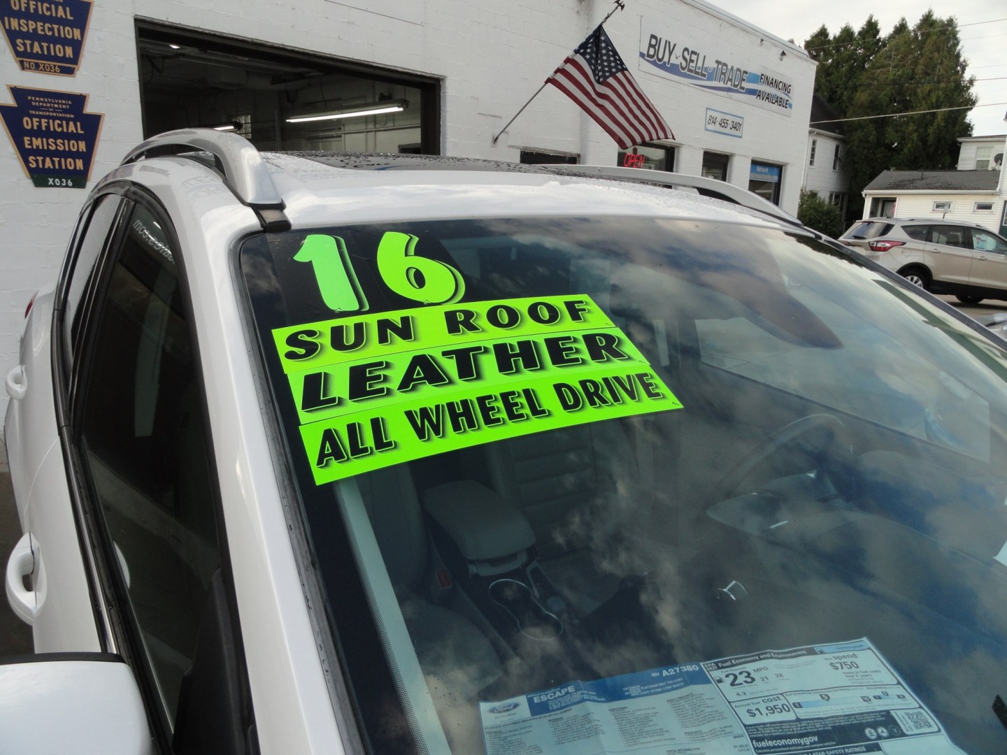 2016 White Platinum Metallic /Tan Ford Escape Titanium 4WD (1FMCU9J92GU) with an 2.0L L4 DOHC 16V engine, 6-Speed Automatic transmission, located at 827 W 26th Street, Erie, PA, 16508, (814) 455-3401, 42.105431, -80.090942 - Thanks for looking at our super clean two owner accident-free recent arrival. This is the Titanium model with four-wheel drive and pretty much has all the options that were available in the 2016 model year. A full service was just completed in our service department with new Pa state and emissions i- Photo#2