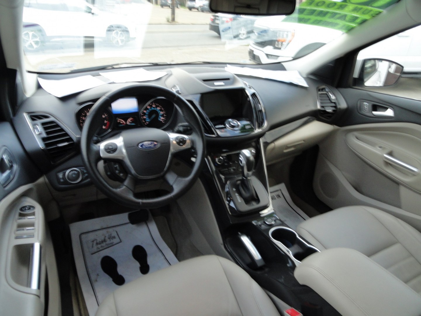 2016 White Platinum Metallic /Tan Ford Escape Titanium 4WD (1FMCU9J92GU) with an 2.0L L4 DOHC 16V engine, 6-Speed Automatic transmission, located at 827 W 26th Street, Erie, PA, 16508, (814) 455-3401, 42.105431, -80.090942 - Thanks for looking at our super clean two owner accident-free recent arrival. This is the Titanium model with four-wheel drive and pretty much has all the options that were available in the 2016 model year. A full service was just completed in our service department with new Pa state and emissions i- Photo#9