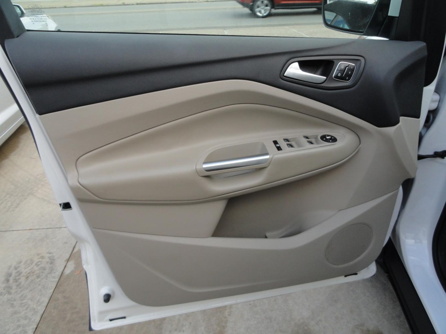 2016 White Platinum Metallic /Tan Ford Escape Titanium 4WD (1FMCU9J92GU) with an 2.0L L4 DOHC 16V engine, 6-Speed Automatic transmission, located at 827 W 26th Street, Erie, PA, 16508, (814) 455-3401, 42.105431, -80.090942 - Thanks for looking at our super clean two owner accident-free recent arrival. This is the Titanium model with four-wheel drive and pretty much has all the options that were available in the 2016 model year. A full service was just completed in our service department with new Pa state and emissions i- Photo#28