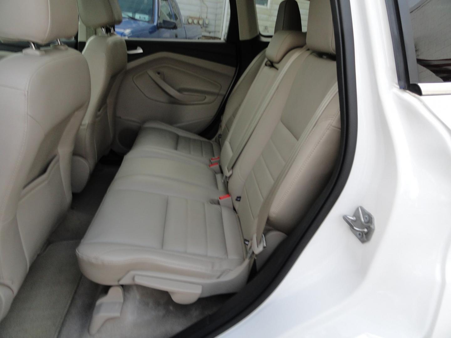 2016 White Platinum Metallic /Tan Ford Escape Titanium 4WD (1FMCU9J92GU) with an 2.0L L4 DOHC 16V engine, 6-Speed Automatic transmission, located at 827 W 26th Street, Erie, PA, 16508, (814) 455-3401, 42.105431, -80.090942 - Thanks for looking at our super clean two owner accident-free recent arrival. This is the Titanium model with four-wheel drive and pretty much has all the options that were available in the 2016 model year. A full service was just completed in our service department with new Pa state and emissions i- Photo#31