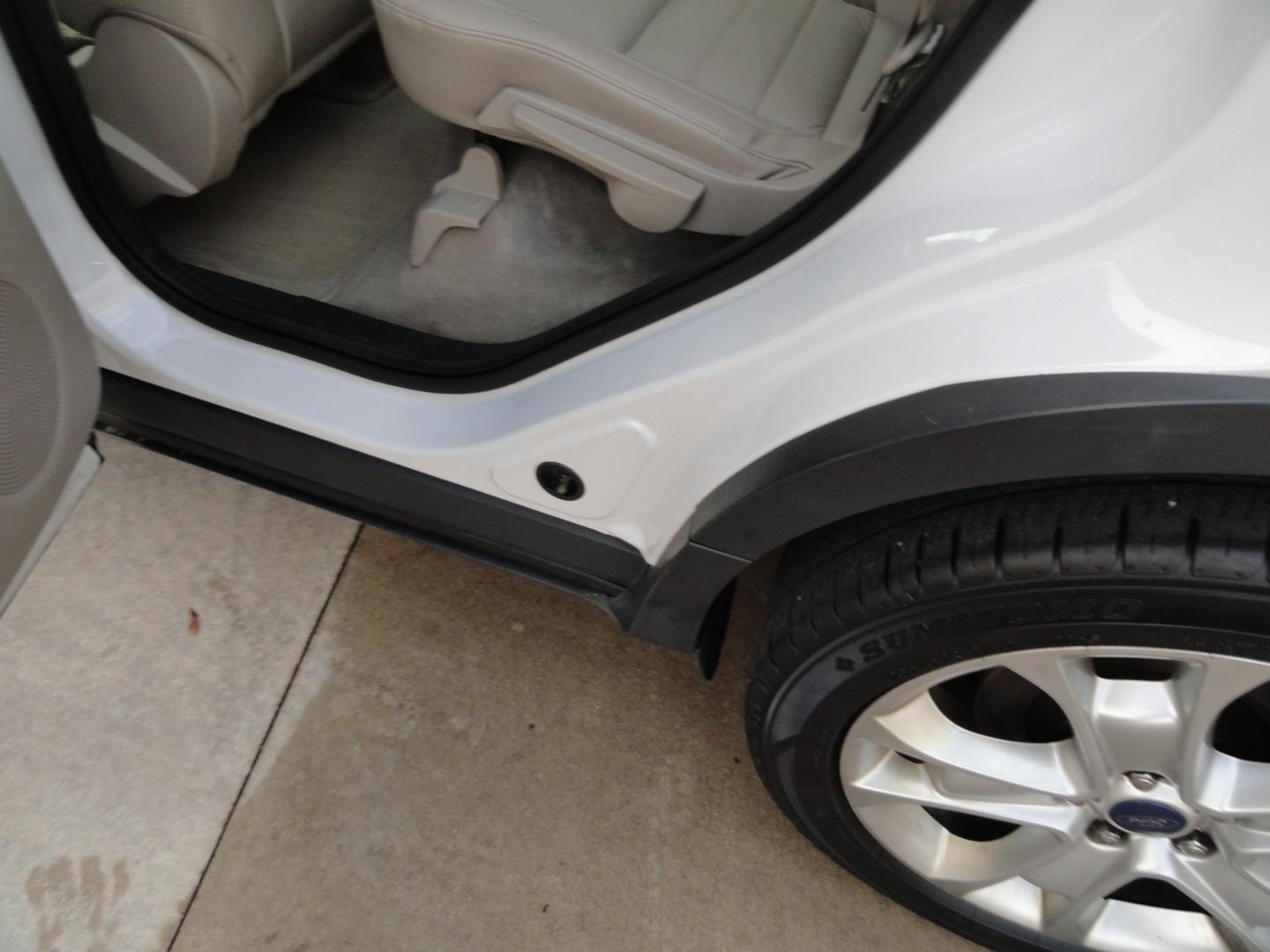 2016 White Platinum Metallic /Tan Ford Escape Titanium 4WD (1FMCU9J92GU) with an 2.0L L4 DOHC 16V engine, 6-Speed Automatic transmission, located at 827 W 26th Street, Erie, PA, 16508, (814) 455-3401, 42.105431, -80.090942 - Thanks for looking at our super clean two owner accident-free recent arrival. This is the Titanium model with four-wheel drive and pretty much has all the options that were available in the 2016 model year. A full service was just completed in our service department with new Pa state and emissions i- Photo#32