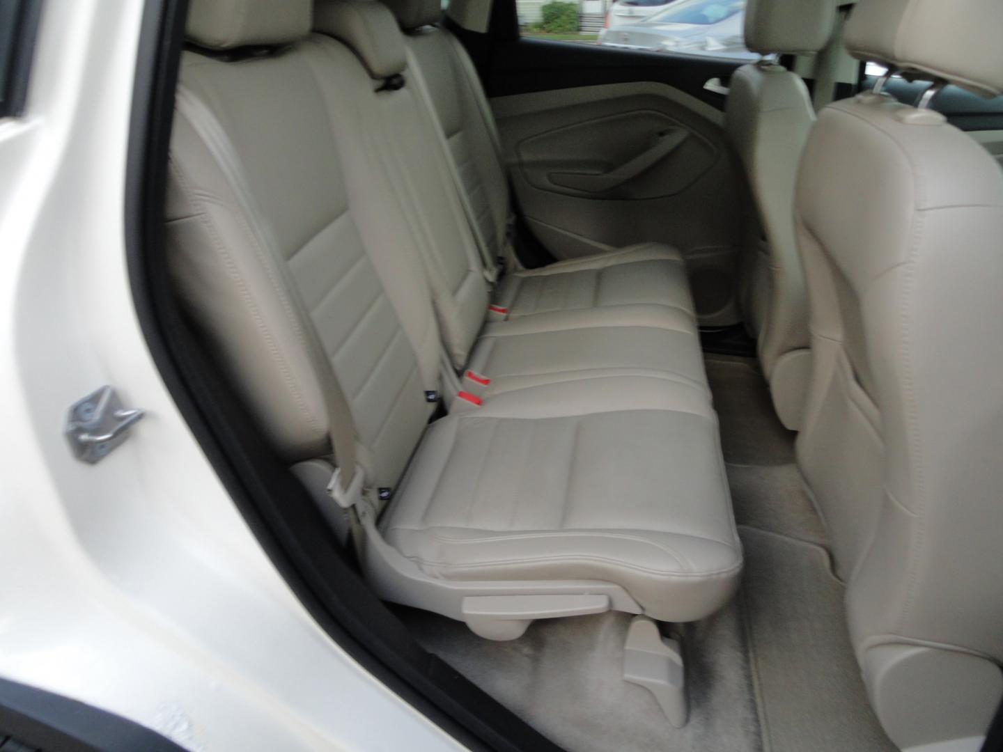 2016 White Platinum Metallic /Tan Ford Escape Titanium 4WD (1FMCU9J92GU) with an 2.0L L4 DOHC 16V engine, 6-Speed Automatic transmission, located at 827 W 26th Street, Erie, PA, 16508, (814) 455-3401, 42.105431, -80.090942 - Thanks for looking at our super clean two owner accident-free recent arrival. This is the Titanium model with four-wheel drive and pretty much has all the options that were available in the 2016 model year. A full service was just completed in our service department with new Pa state and emissions i- Photo#39
