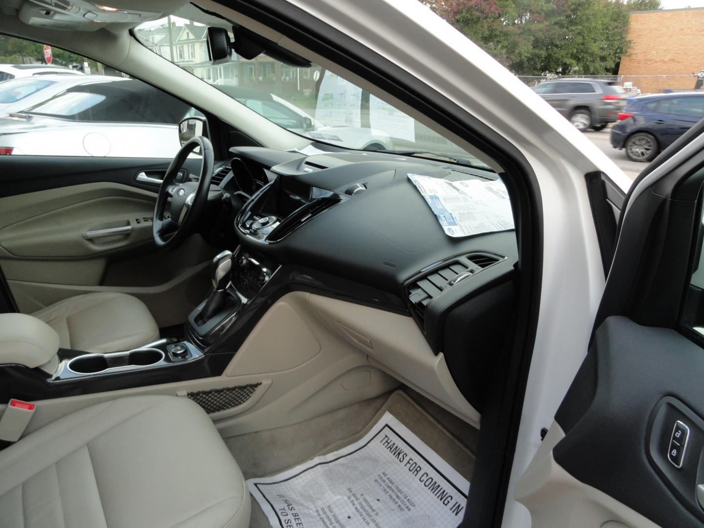2016 White Platinum Metallic /Tan Ford Escape Titanium 4WD (1FMCU9J92GU) with an 2.0L L4 DOHC 16V engine, 6-Speed Automatic transmission, located at 827 W 26th Street, Erie, PA, 16508, (814) 455-3401, 42.105431, -80.090942 - Thanks for looking at our super clean two owner accident-free recent arrival. This is the Titanium model with four-wheel drive and pretty much has all the options that were available in the 2016 model year. A full service was just completed in our service department with new Pa state and emissions i- Photo#43