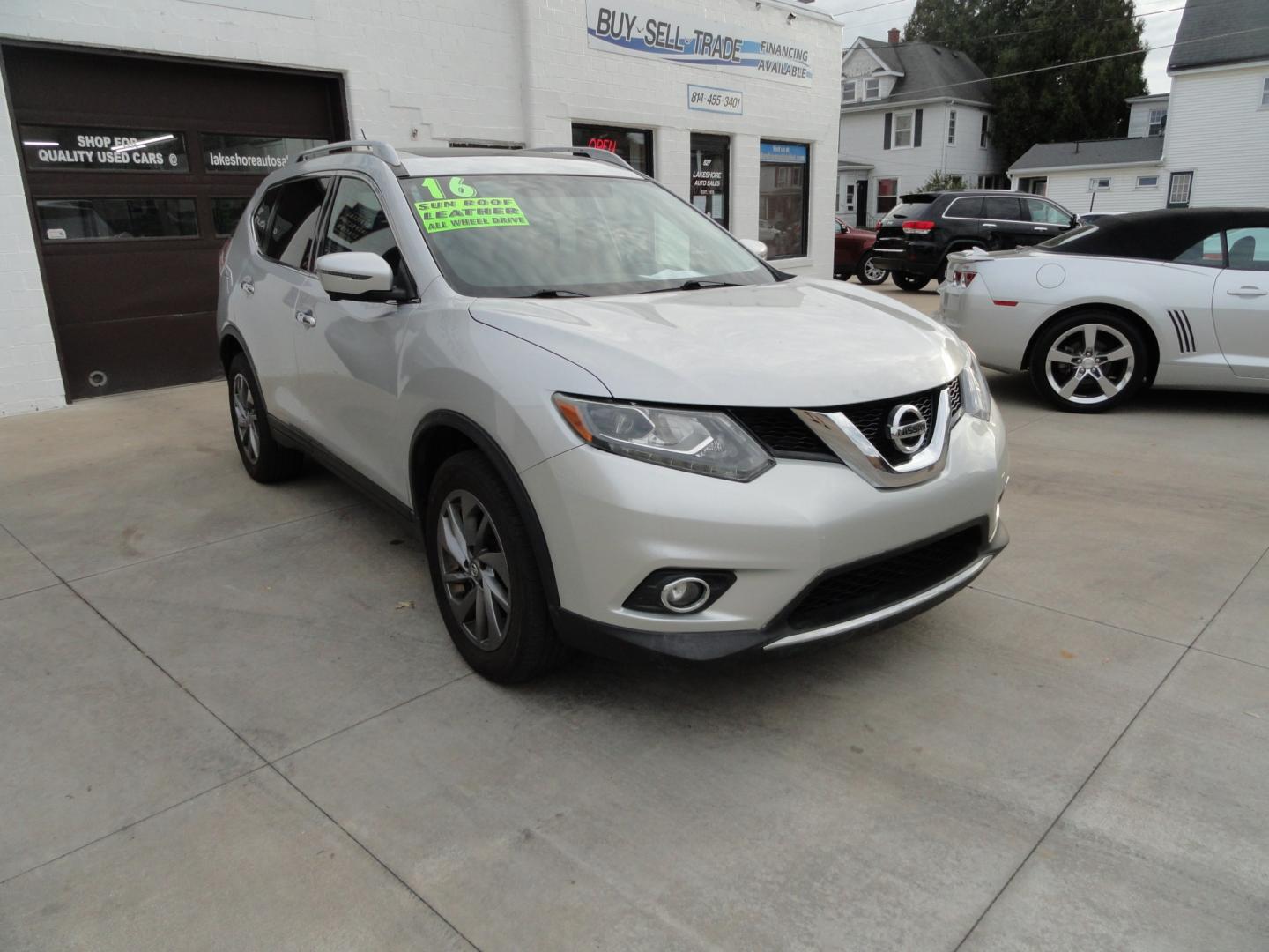 2016 Brilliant Silver Metallic /Jet Black Nissan Rogue SL AWD (5N1AT2MV7GC) with an 2.5L L4 DOHC 16V engine, CVT transmission, located at 827 W 26th Street, Erie, PA, 16508, (814) 455-3401, 42.105431, -80.090942 - Thanks for looking at our two-owner accident-free recent arrival. This is the SL model all-wheel drive with just about every item that was available in the 2016 model year and yes, I know it has a few miles but it's in like new condition and the engine was just recently replace with one that has onl- Photo#0