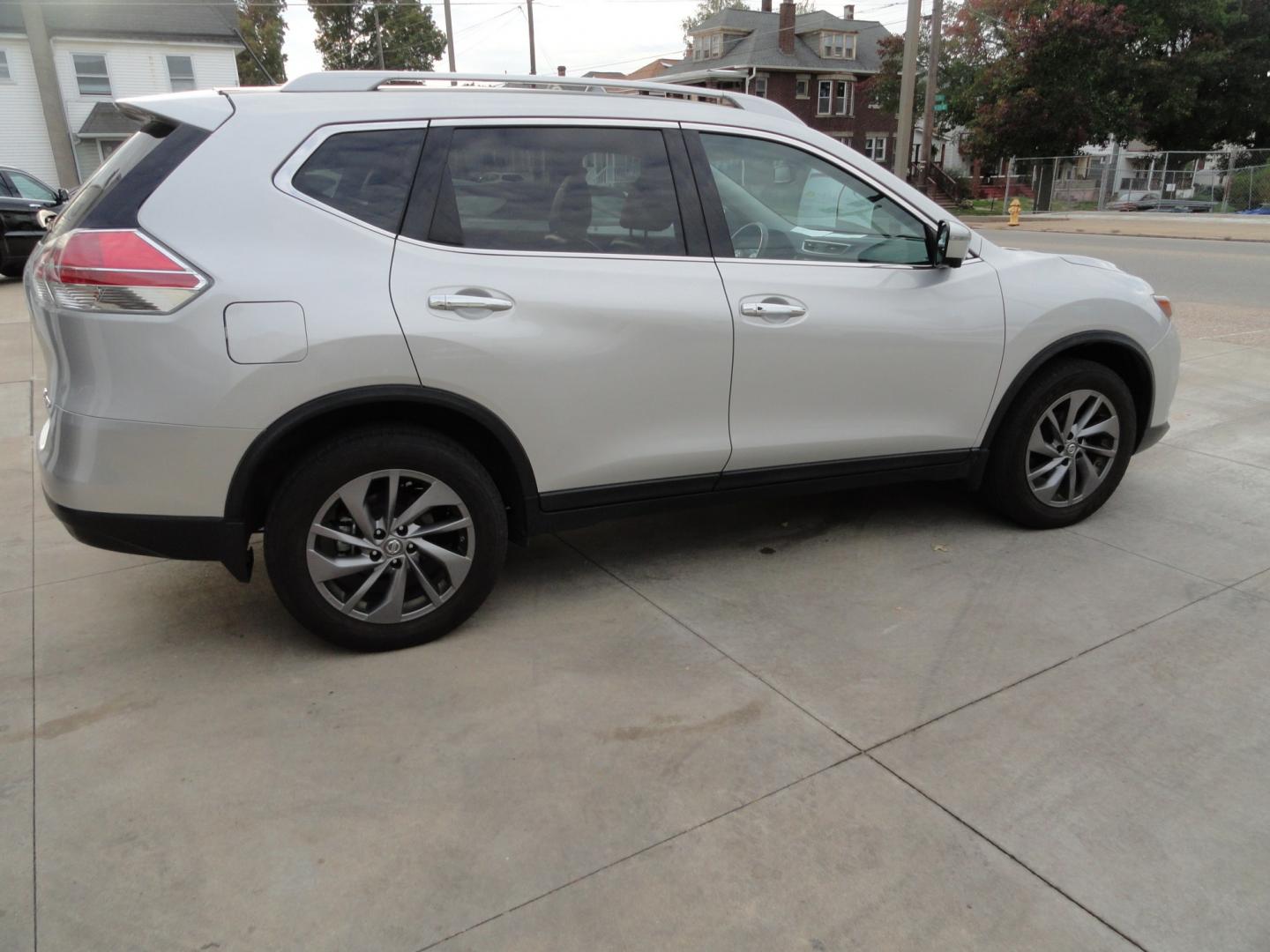 2016 Brilliant Silver Metallic /Jet Black Nissan Rogue SL AWD (5N1AT2MV7GC) with an 2.5L L4 DOHC 16V engine, CVT transmission, located at 827 W 26th Street, Erie, PA, 16508, (814) 455-3401, 42.105431, -80.090942 - Thanks for looking at our two-owner accident-free recent arrival. This is the SL model all-wheel drive with just about every item that was available in the 2016 model year and yes, I know it has a few miles but it's in like new condition and the engine was just recently replace with one that has onl- Photo#3