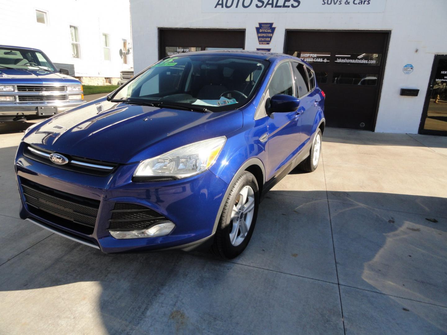 2015 Deep Impact Blue /Greystone Ford Escape SE 4WD (1FMCU9GX9FU) with an 1.6L L4 DOHC 16V engine, 6-Speed Automatic transmission, located at 827 W 26th Street, Erie, PA, 16508, (814) 455-3401, 42.105431, -80.090942- Photo#7