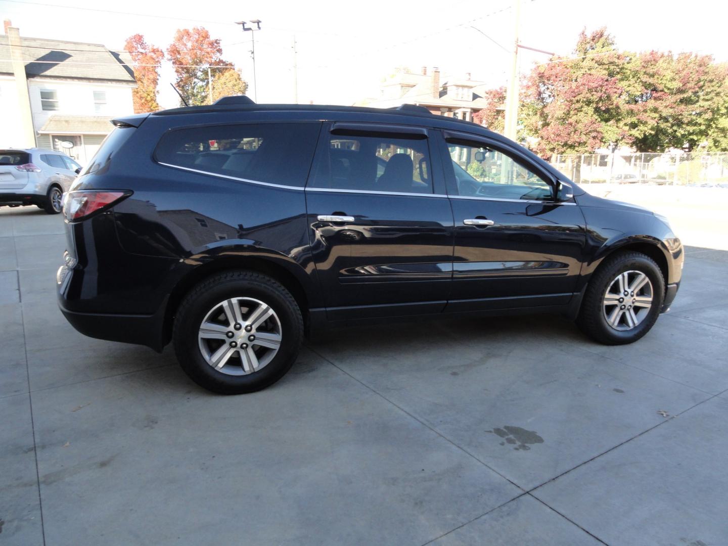 2015 Blue Velvet Metallic /Jet Black Chevrolet Traverse LT AWD (1GNKVGKDXFJ) with an 3.6L V6 DOHC 24V engine, 6-Speed Automatic transmission, located at 827 W 26th Street, Erie, PA, 16508, (814) 455-3401, 42.105431, -80.090942 - Thanks for looking at our two-owner accident and rust-free new vehicle trade. This is the LT all-wheel drive with power heated seats, back up camera, remote start and lots more. A full service was just completed in our service department and the previous owner just put on four new Goodyear tires. If- Photo#2