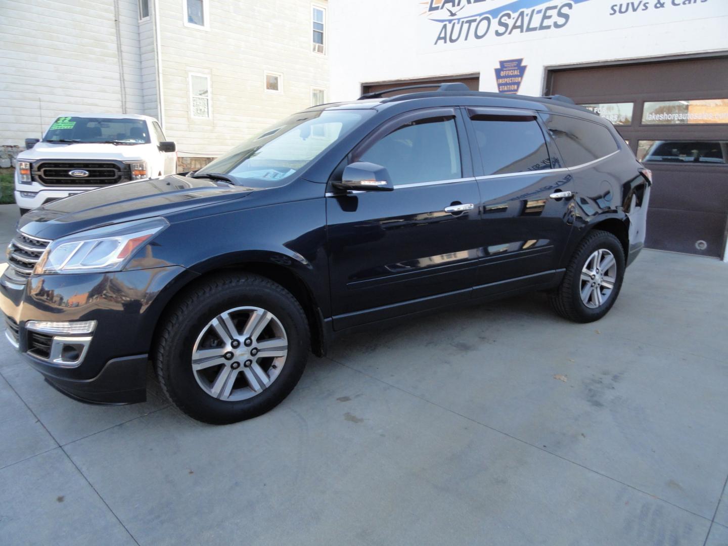 2015 Blue Velvet Metallic /Jet Black Chevrolet Traverse LT AWD (1GNKVGKDXFJ) with an 3.6L V6 DOHC 24V engine, 6-Speed Automatic transmission, located at 827 W 26th Street, Erie, PA, 16508, (814) 455-3401, 42.105431, -80.090942 - Thanks for looking at our two-owner accident and rust-free new vehicle trade. This is the LT all-wheel drive with power heated seats, back up camera, remote start and lots more. A full service was just completed in our service department and the previous owner just put on four new Goodyear tires. If- Photo#5